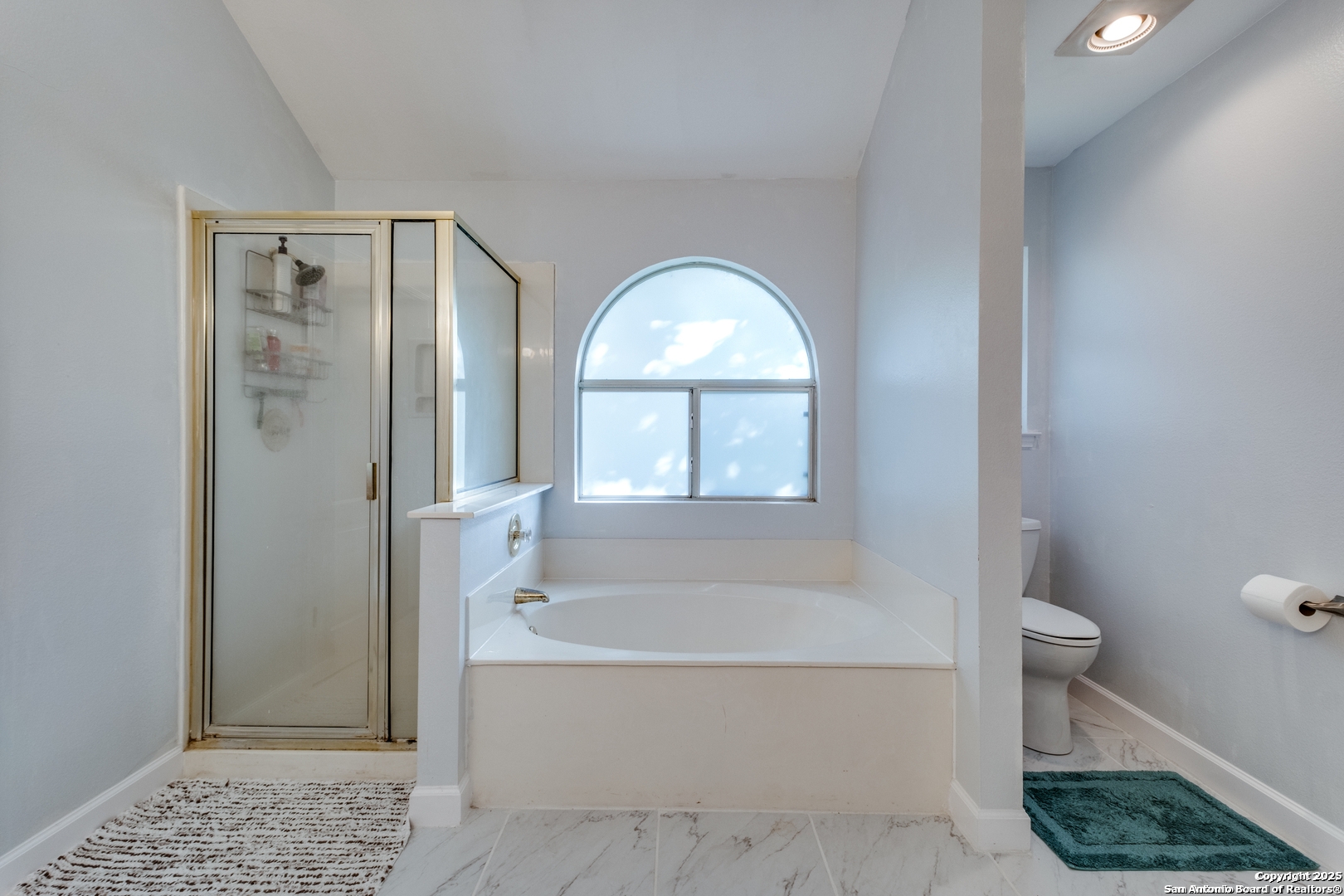 16558 Redland Ranch San Antonio, TX 78247 - Photo 8 of 15 a bathroom with a granite countertop bathtub shower and toilet