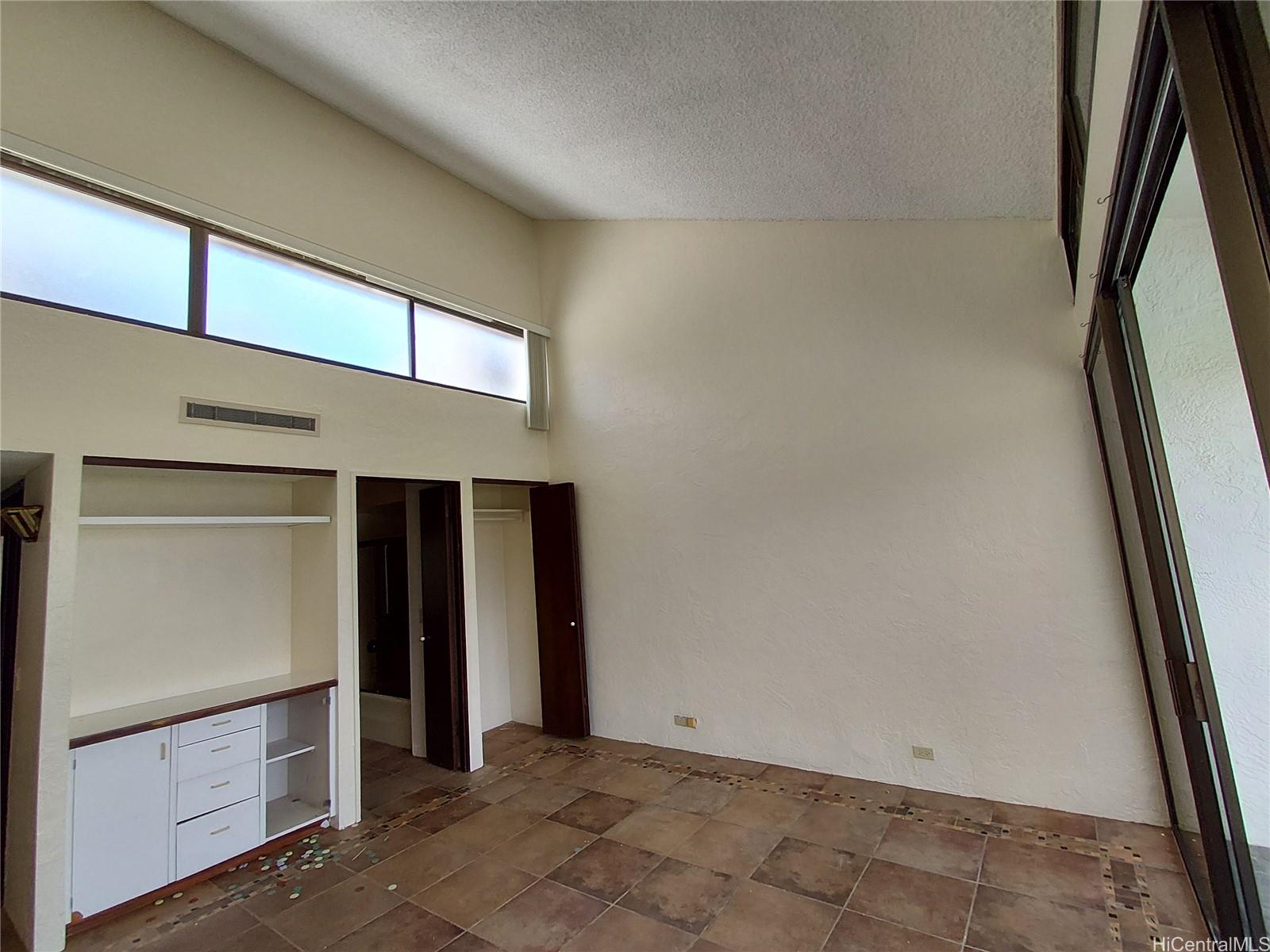 500 Lunalilo Home Road, Unit 18C Honolulu, HI 96825 - Photo 12 of 22 a view of an empty room