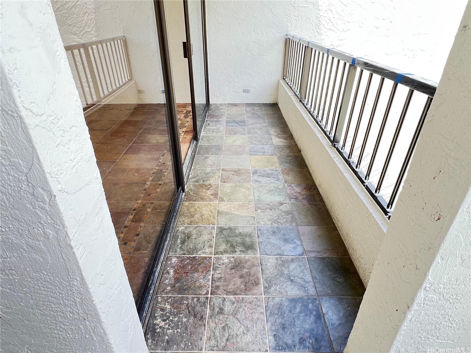 500 Lunalilo Home Road, Unit 18C Honolulu, HI 96825 - Photo 16 of 22 wooden floor with a window