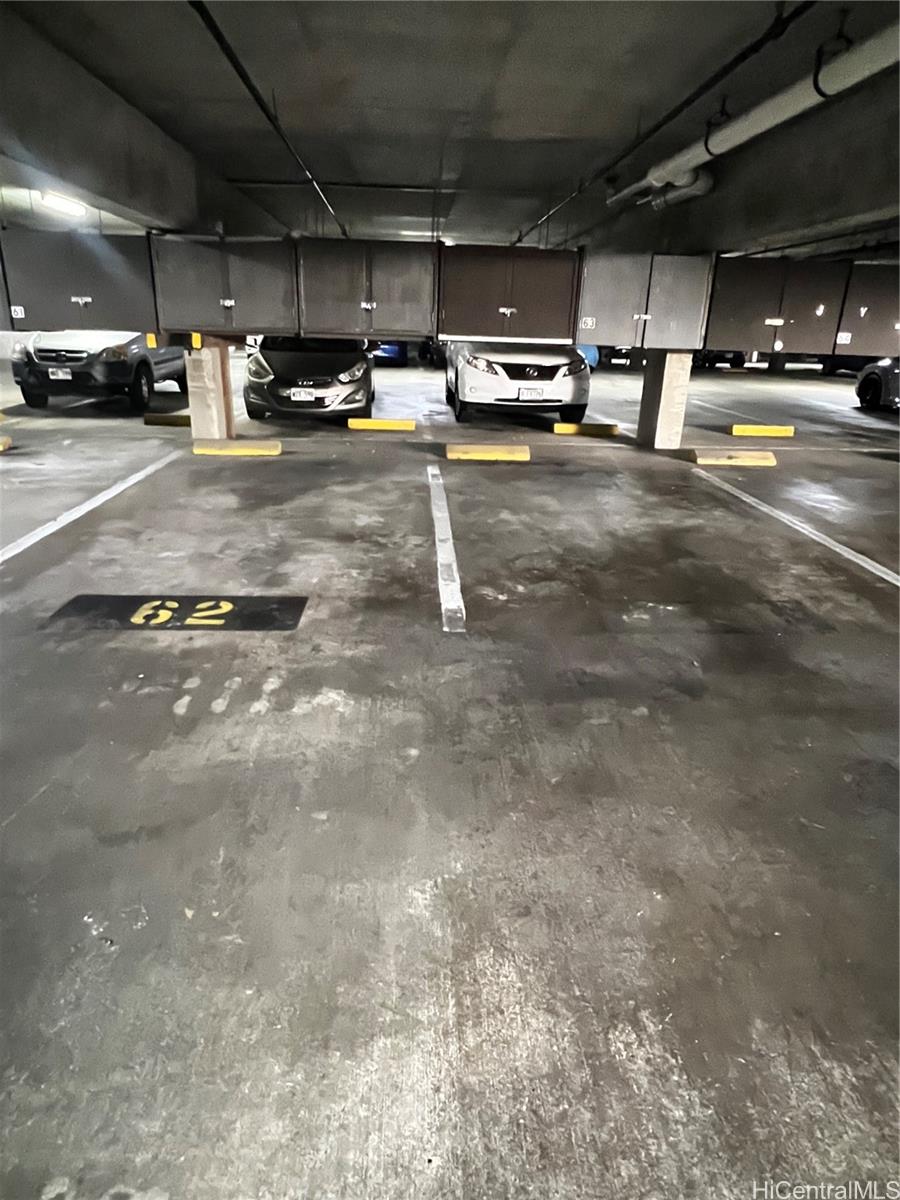 500 Lunalilo Home Road, Unit 18C Honolulu, HI 96825 - Photo 21 of 22 a view of parking garage with cars