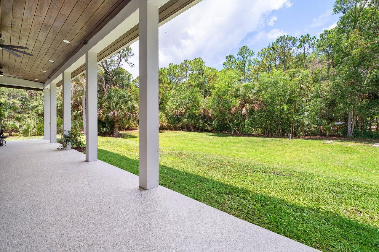 11871 160th Road North Jupiter, FL 33478 - Photo 36 of 66 Covered Lanai | Living Area