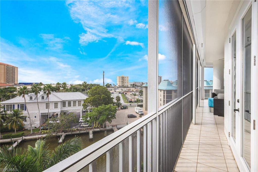 a view of a balcony with city view