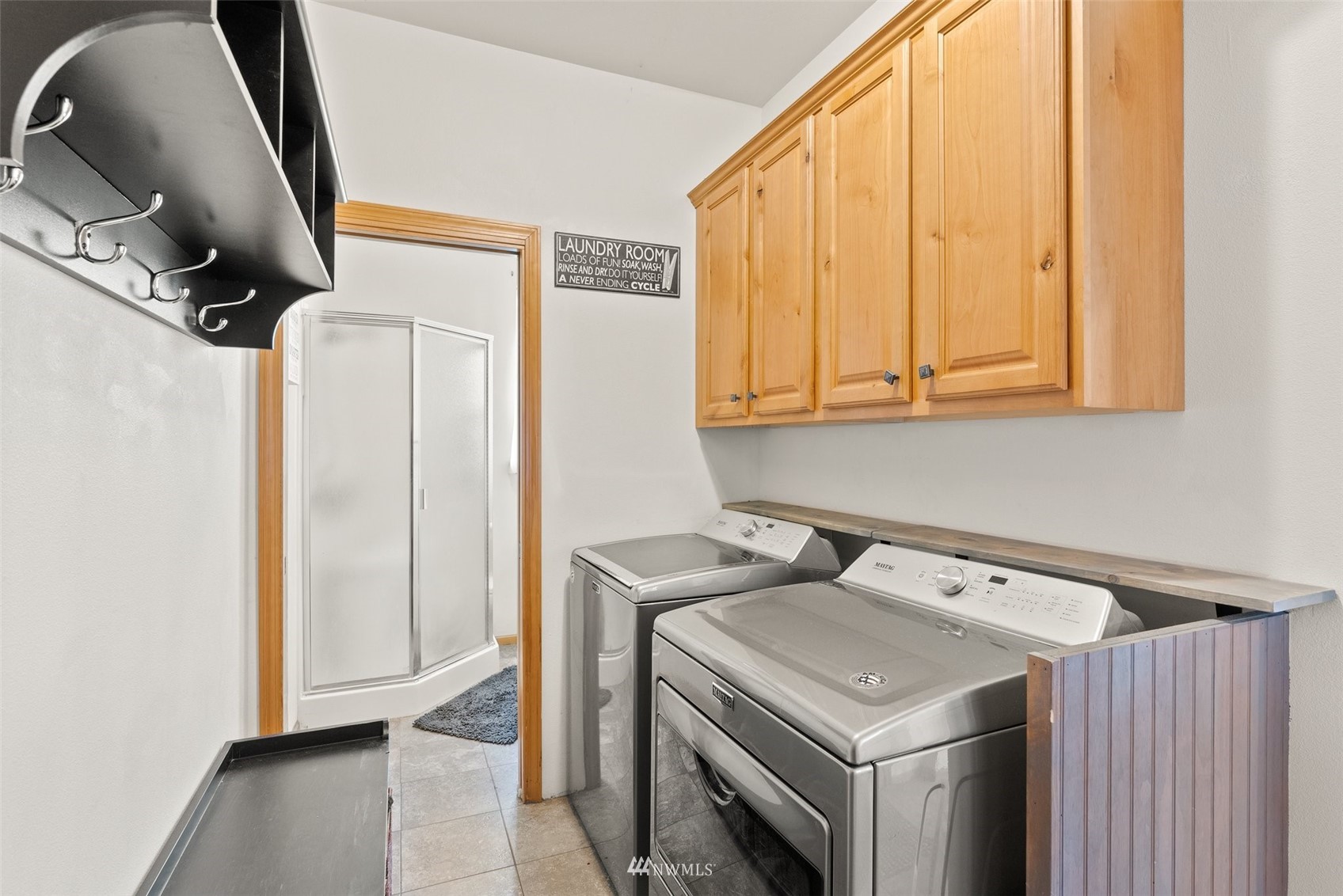 356 Wells Road Pe Ell, WA 98572 - Photo 19 of 40 a utility room with dryer and washer