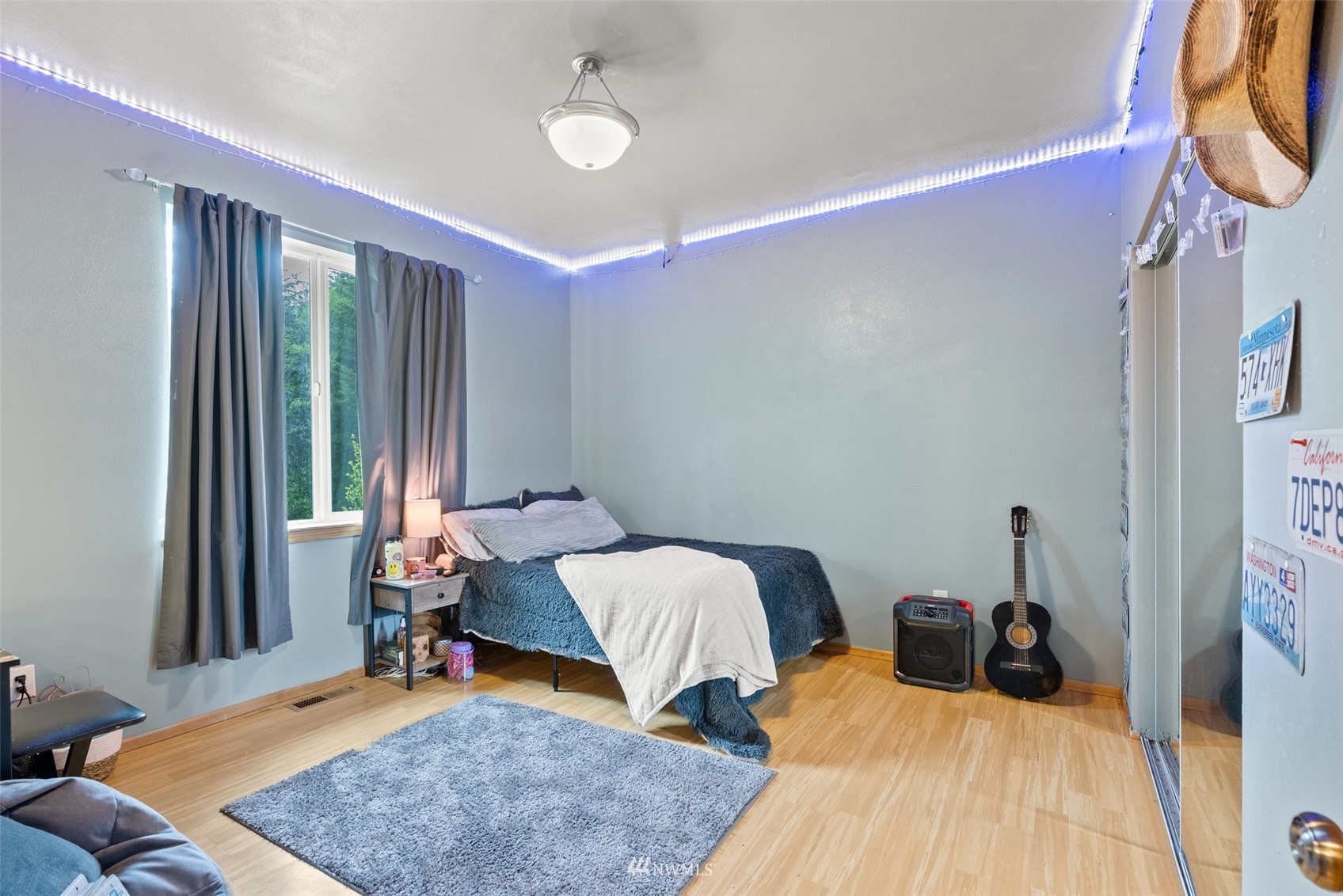 356 Wells Road Pe Ell, WA 98572 - Photo 25 of 40 a bedroom with bed and a window