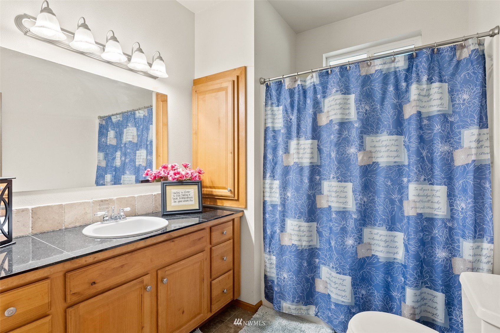 356 Wells Road Pe Ell, WA 98572 - Photo 26 of 40 a bathroom with a double vanity sink mirror and shower