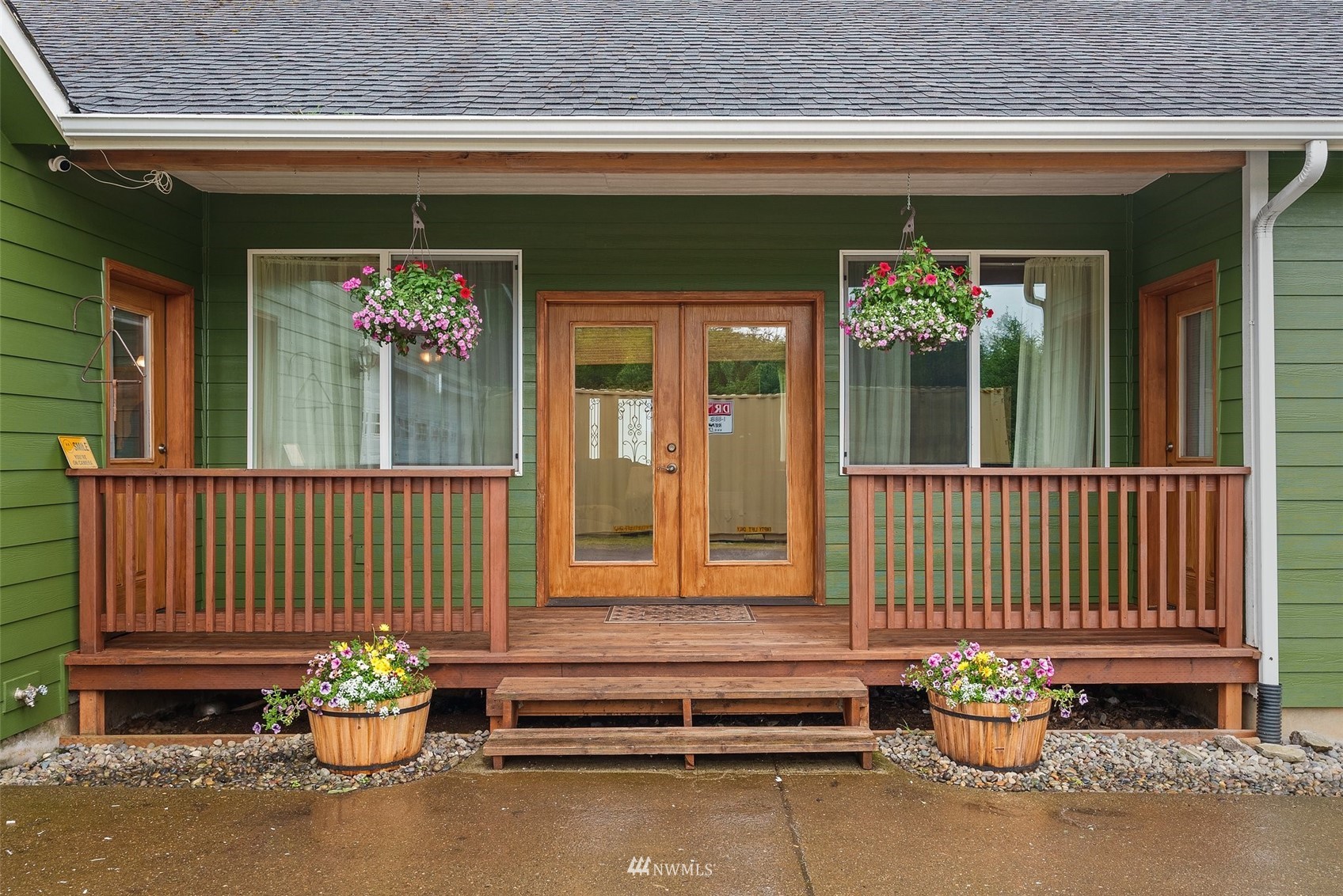 356 Wells Road Pe Ell, WA 98572 - Photo 31 of 40 a front view of a house with entryway