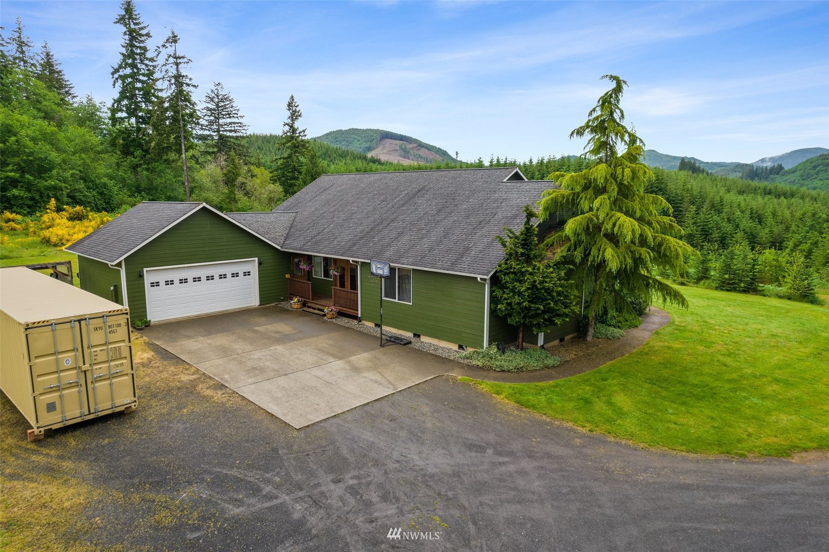 356 Wells Road Pe Ell, WA 98572 - Photo 32 of 40 a view of a house with a big yard plants and large tree