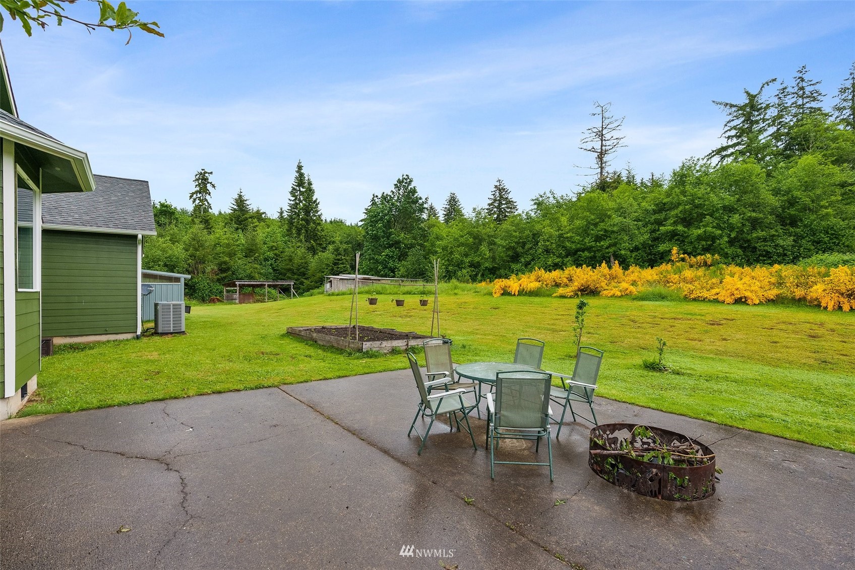 356 Wells Road Pe Ell, WA 98572 - Photo 37 of 40 a view of a swimming pool and a yard