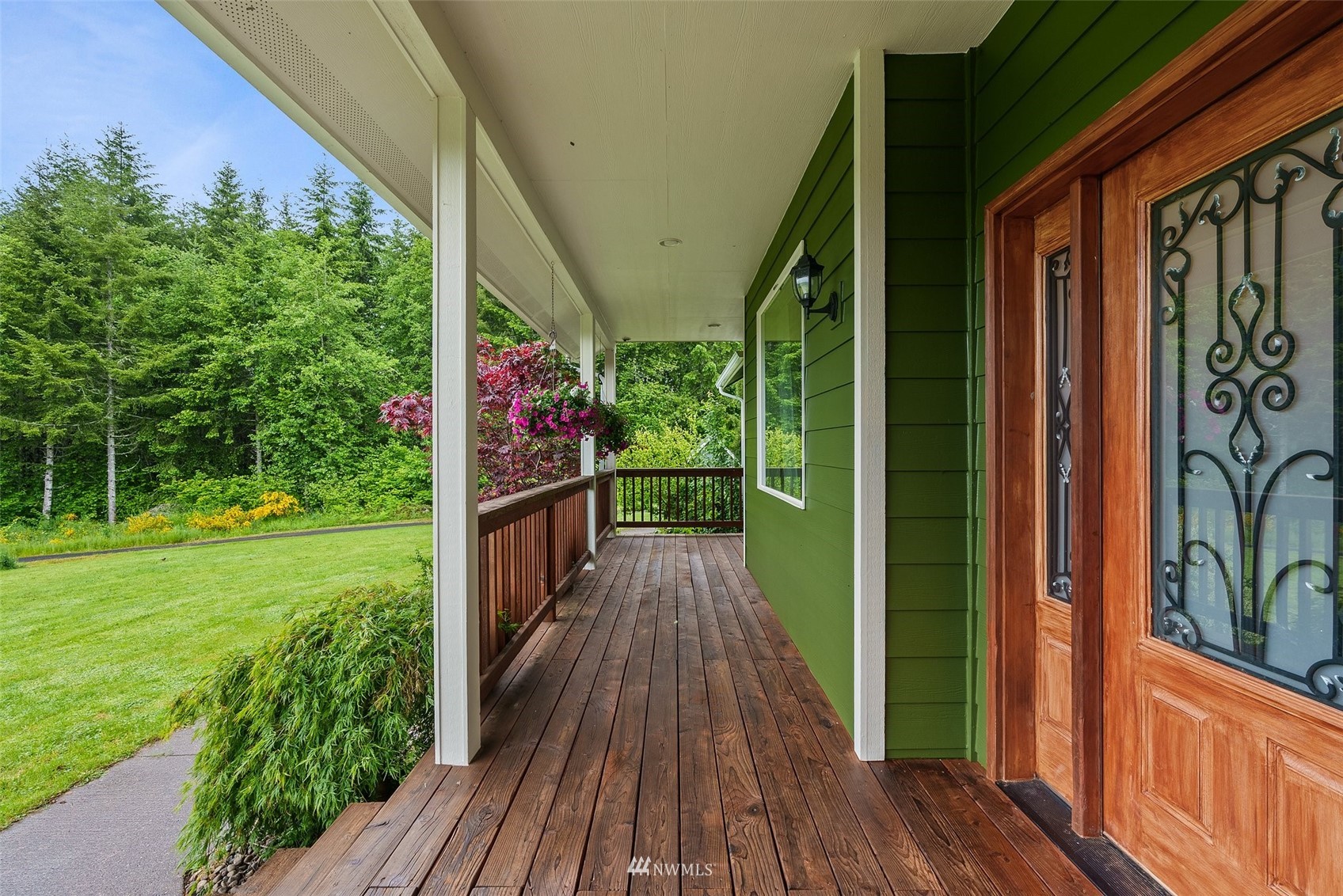 356 Wells Road Pe Ell, WA 98572 - Photo 5 of 40 a view of a balcony with wooden floor