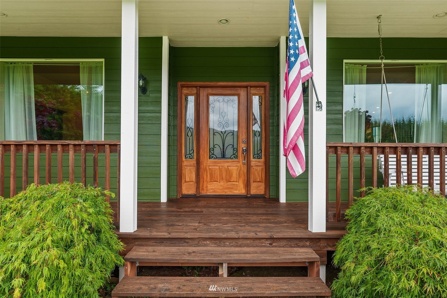356 Wells Road Pe Ell, WA 98572 - Photo 7 of 40 a front view of a house with a porch