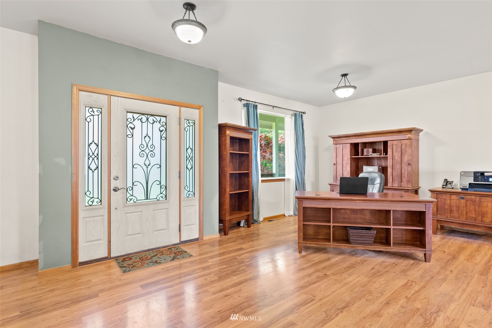 356 Wells Road Pe Ell, WA 98572 - Photo 8 of 40 a view of livingroom with furniture wooden floor and window