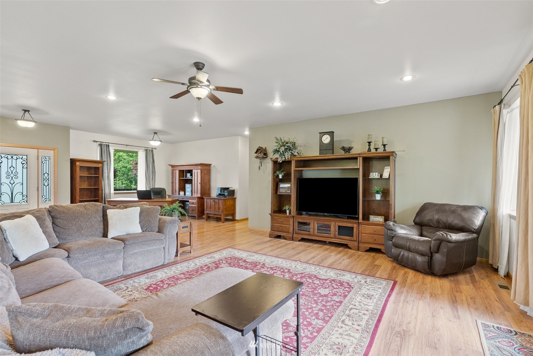 356 Wells Road Pe Ell, WA 98572 - Photo 9 of 40 a living room with furniture and a flat screen tv