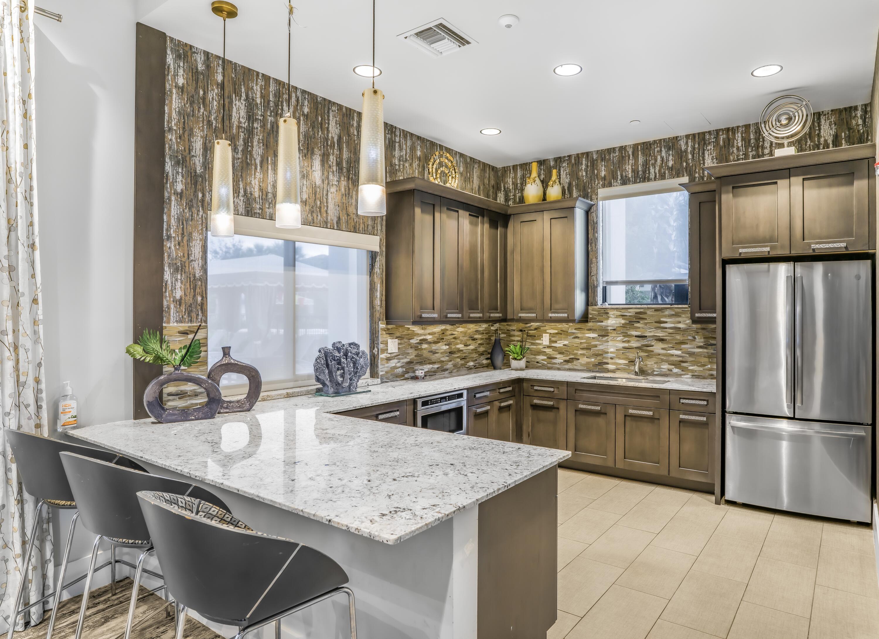 15405 Blue River Road Delray Beach, FL 33446 - Photo 57 of 58 CLUBHOUSE KITCHEN