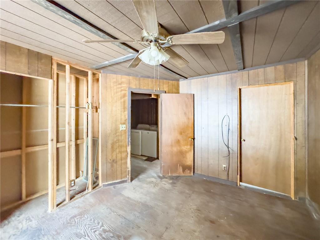 1167 Woolendean Road Treasure Lake, PA 15801 - Photo 16 of 36 an empty room with wooden floor and entryway