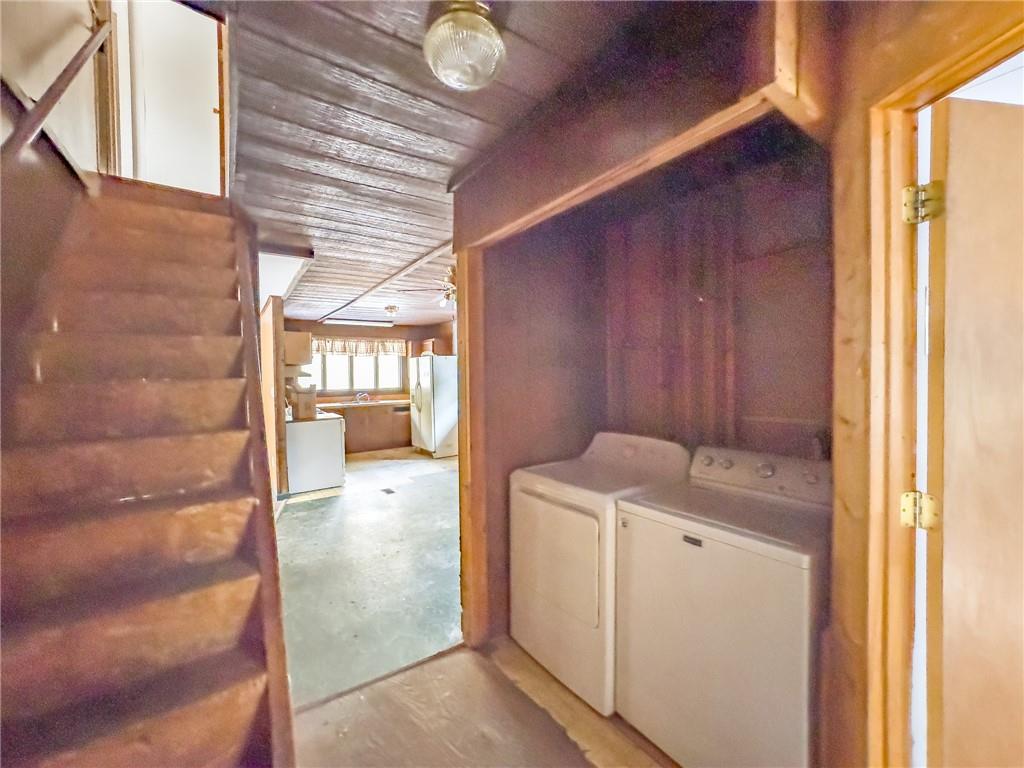 1167 Woolendean Road Treasure Lake, PA 15801 - Photo 21 of 36 a utility room with dryer and washer
