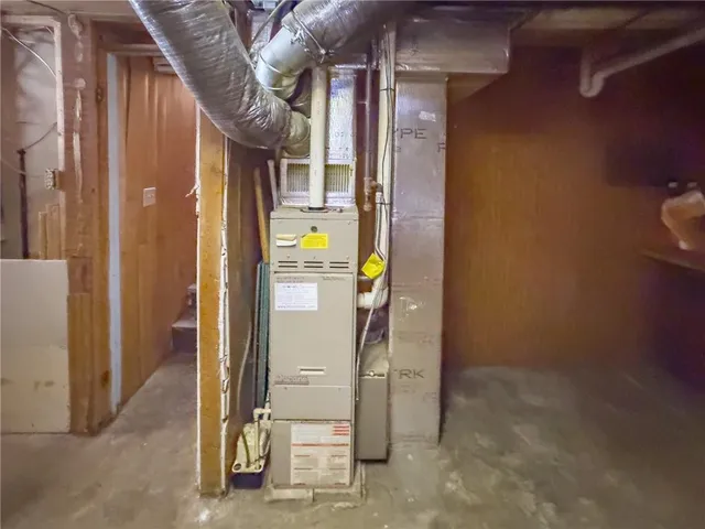 a view of a room with lots of gym equipment