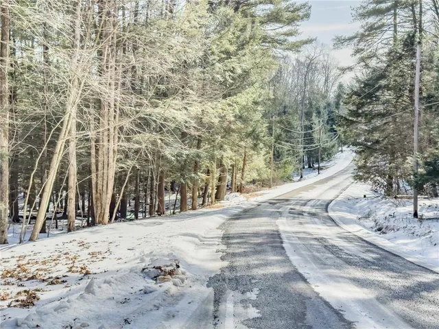 a view of a backyard of the house