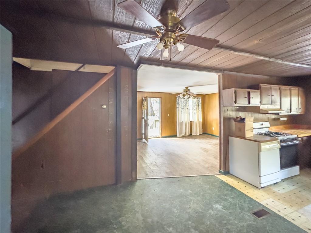 1167 Woolendean Road Treasure Lake, PA 15801 - Photo 8 of 36 a view of a kitchen with a sink and a refrigerator