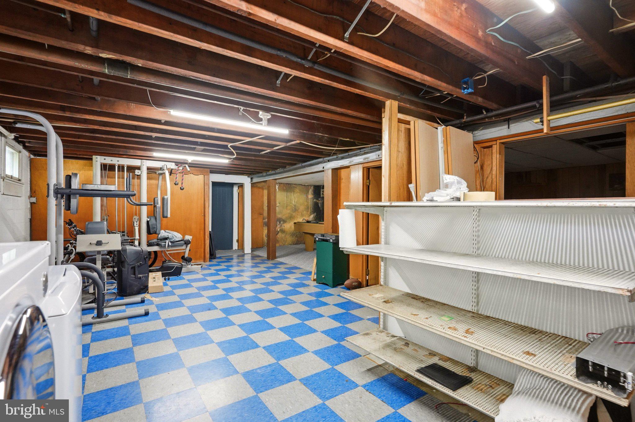 19 South Tilbury Road Salem, NJ 08079 - Photo 21 of 25 Spacious basement with checkerboard floor.