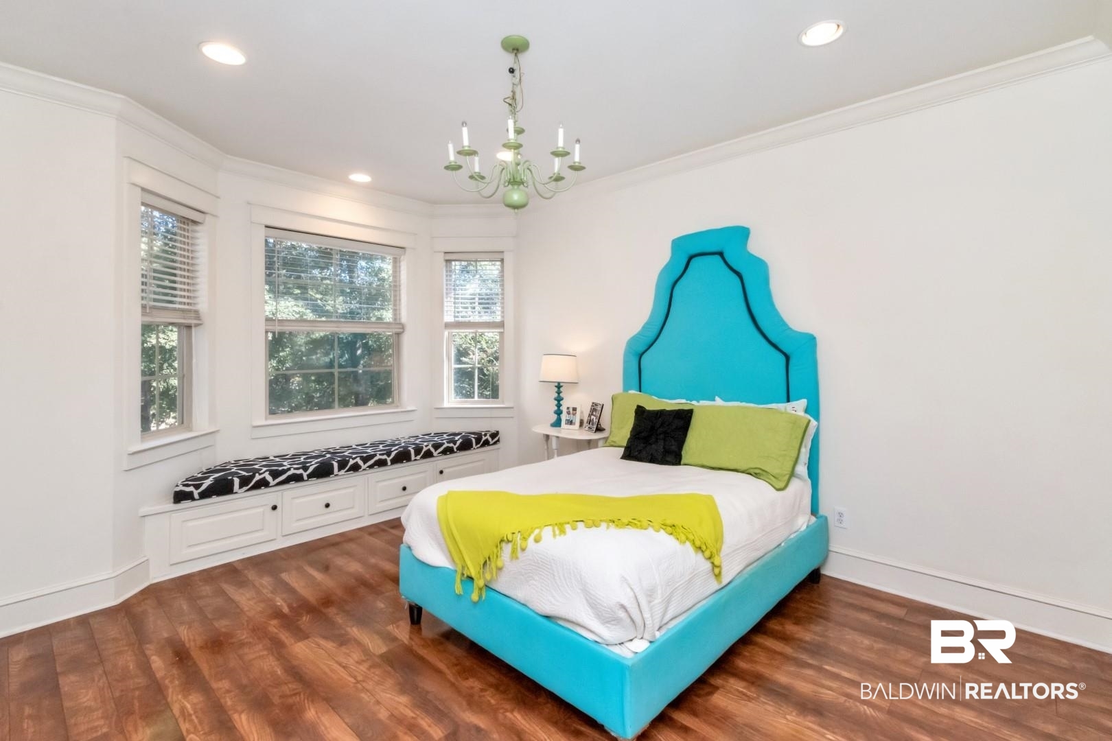8868 Dawes Lake Road South Mobile, AL 36619 - Photo 26 of 35 Bedroom featuring multiple windows, ornamental molding, and dark hardwood / wood-style flooring