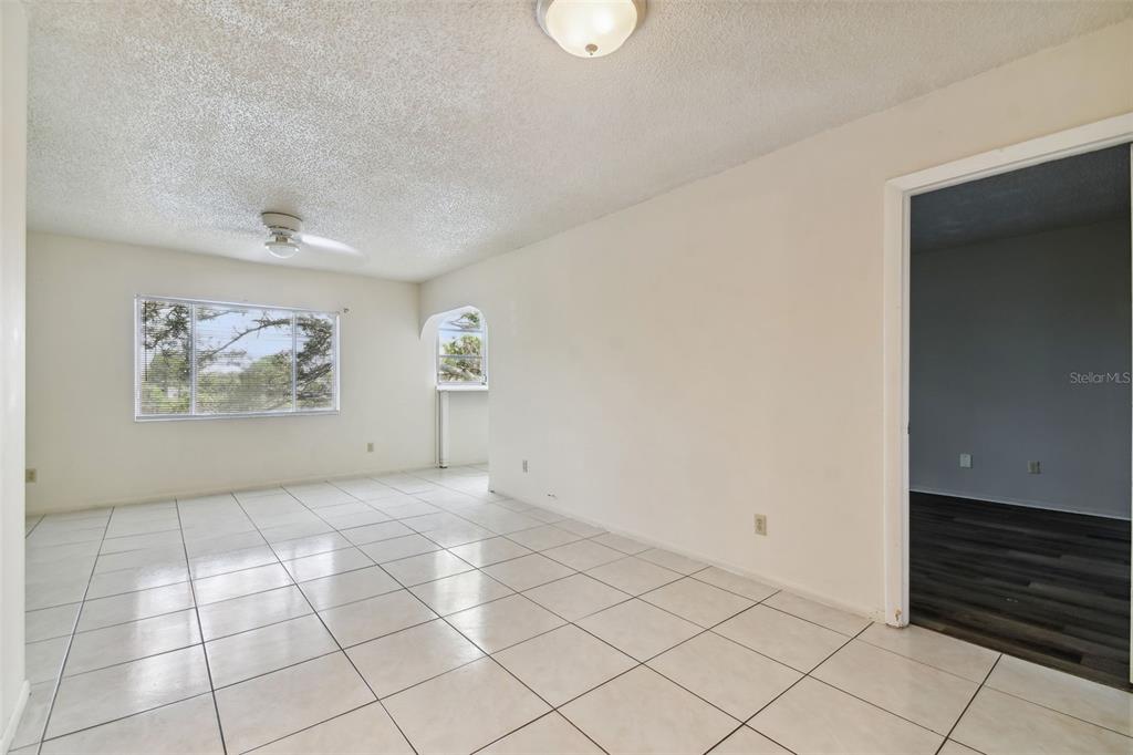 645 North Keene Road, Unit D Clearwater, FL 33755 - Photo 4 of 27 a view of an empty room with a window