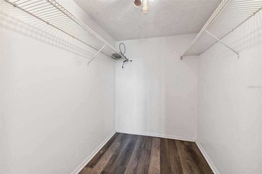 645 North Keene Road, Unit D Clearwater, FL 33755 - Photo 9 of 27 a view of small space with racks on the wall