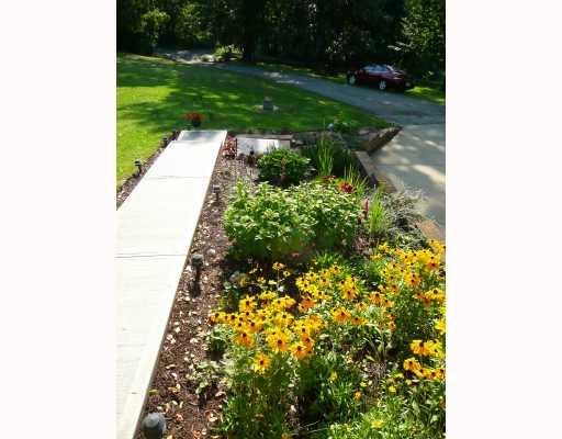 277 Forsythe Road Valencia, PA 16059 - Photo 14 of 14 Yard/Garden. FRONT GARDENS ALONG NEW SIDEWALK AND BELOW NEW FRONT DECK/PORCH