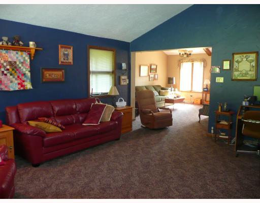 277 Forsythe Road Valencia, PA 16059 - Photo 4 of 14 Den/Family/Great Room. HUGE FAMILY ROOM WITH A WALL OF WINDOWS OVERLOOKING PRIVATE REAR YARD, VAULTED CEILING, CEILING FAN.