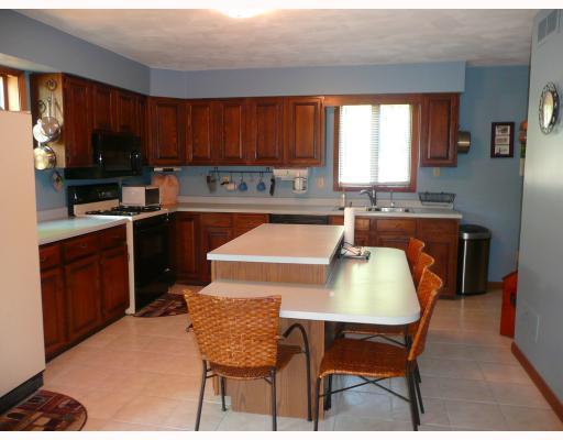277 Forsythe Road Valencia, PA 16059 - Photo 6 of 14 Kitchen. CENTER ISLAND COUNTRY KITCHEN WITH EAT-ON BREAKFAST BAR.