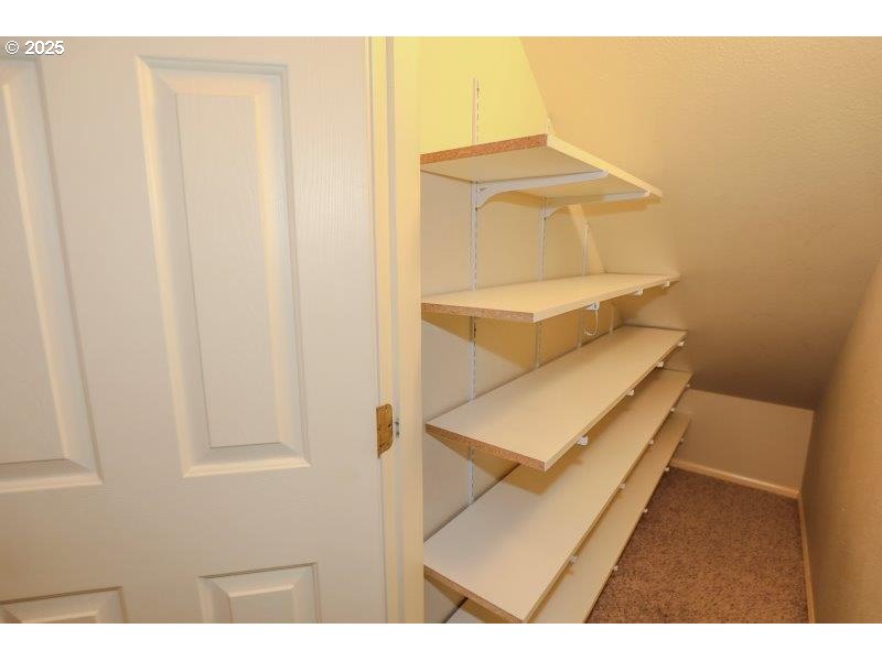 1147 Southeast Kane Street Roseburg, OR 97470 - Photo 19 of 41 a living room with a couch