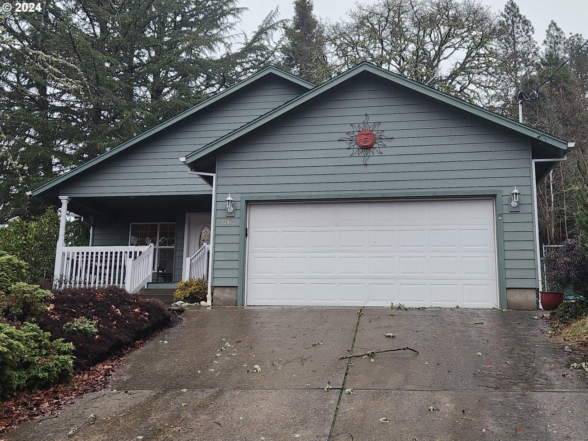 1147 Southeast Kane Street Roseburg, OR 97470 - Photo 2 of 41 a view of a house with a yard