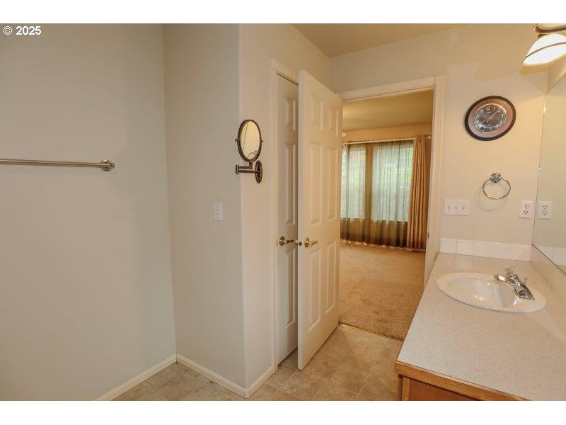 1147 Southeast Kane Street Roseburg, OR 97470 - Photo 25 of 41 a bathroom with a sink and a shower