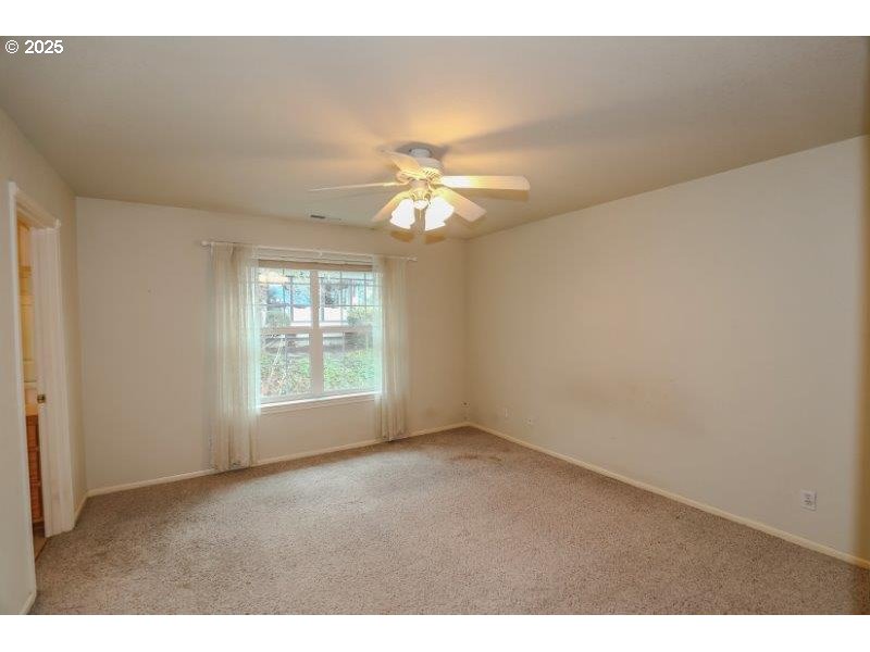 1147 Southeast Kane Street Roseburg, OR 97470 - Photo 31 of 41 a view of an empty room with a window