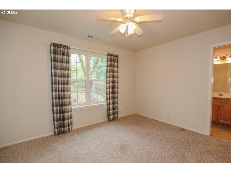 1147 Southeast Kane Street Roseburg, OR 97470 - Photo 35 of 41 a view of an empty room with a window