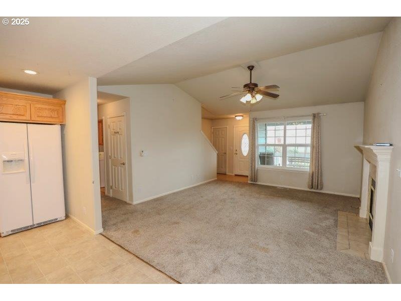 1147 Southeast Kane Street Roseburg, OR 97470 - Photo 9 of 41 a view of an empty room with a window