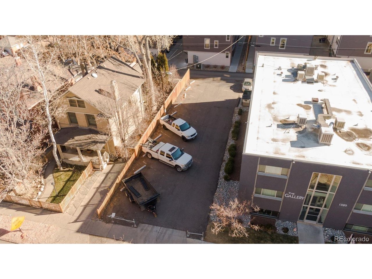 1324 Garfield Street Denver, CO 80206 - Photo 13 of 22 an aerial view of a kitchen with many windows