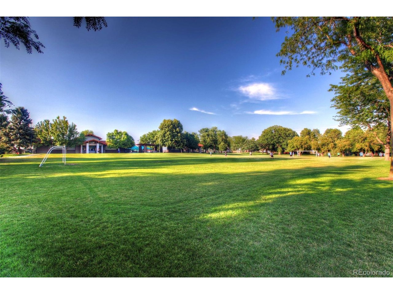 1324 Garfield Street Denver, CO 80206 - Photo 22 of 22 a view of a golf course with a lake
