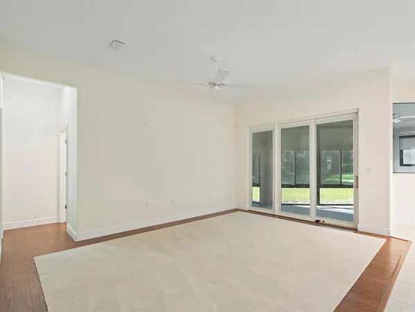 a view of a kitchen with a sink and cabinets