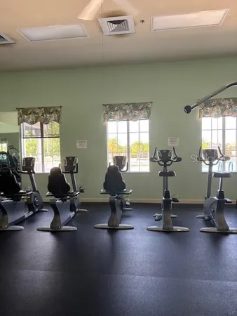 a group of people sitting at tables in a room