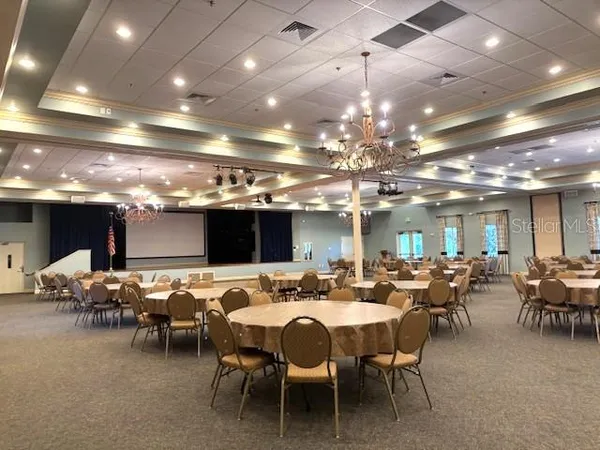 a kitchen with a table and chairs in it