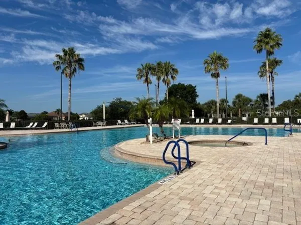 a view of a park with swings and slides