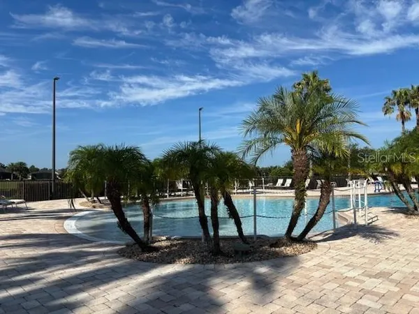 a view of a terrace with sitting area