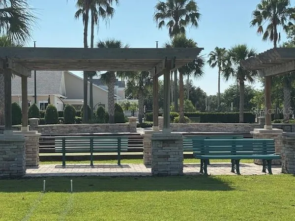 a view of swimming pool with a yard