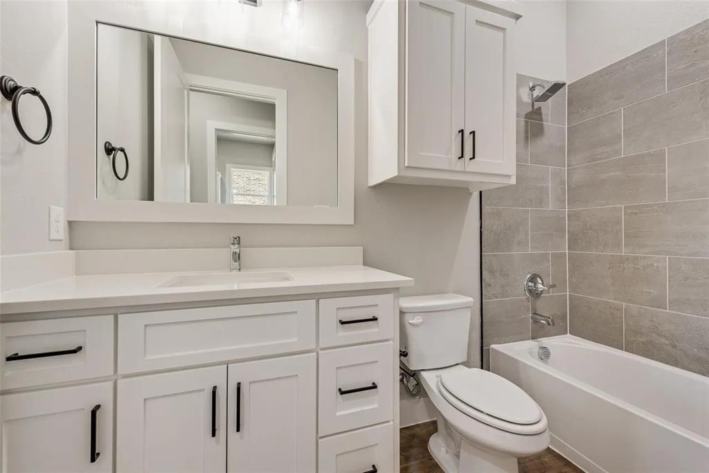 1327 Selby Road Van Alstyne, TX 75495 - Photo 14 of 32 Full bath with vanity and shower / bathtub combination