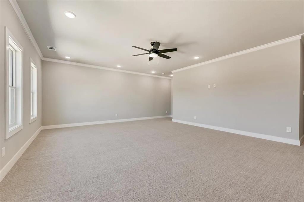 1327 Selby Road Van Alstyne, TX 75495 - Photo 16 of 32 Unfurnished room with light carpet, a ceiling fan, ornamental molding, and recessed lighting