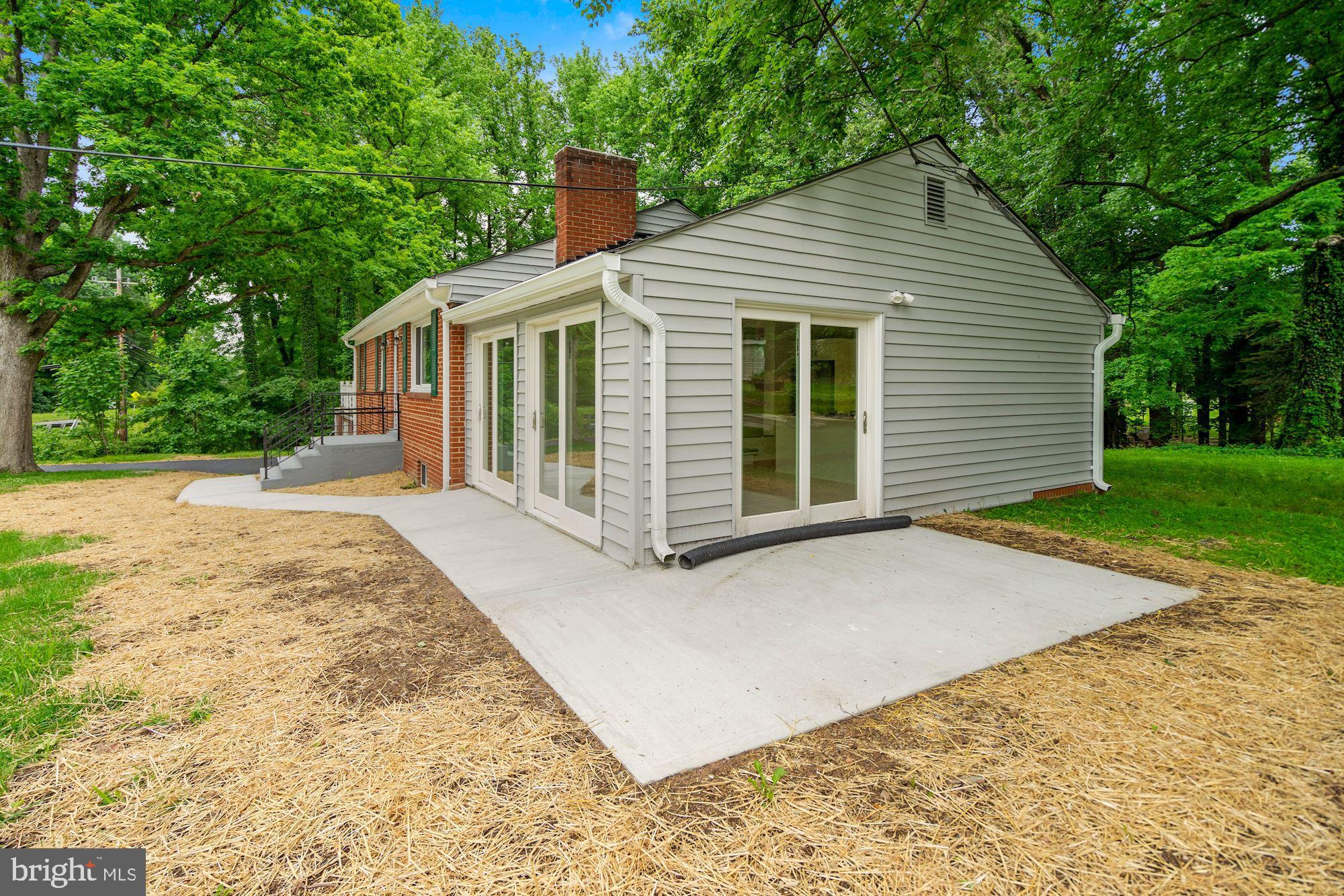9101 Old Keene Mill Road Springfield, VA 22152 - Photo 24 of 28 a view of a house with a yard
