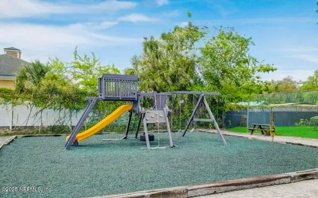 a view of a park with a slide