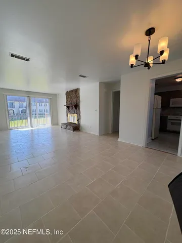 a view of a livingroom with furniture