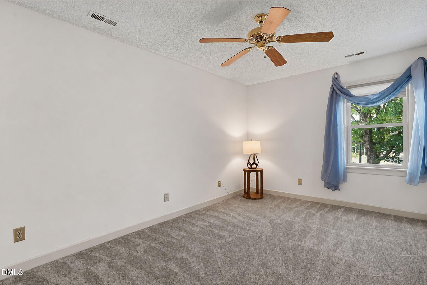 1210 Shadow Bark Court Raleigh, NC 27603 - Photo 19 of 29 a view of an empty room with a window
