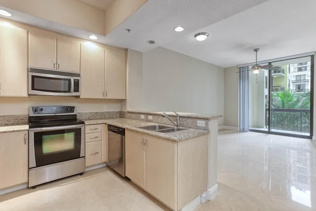 a kitchen with a stove and a microwave